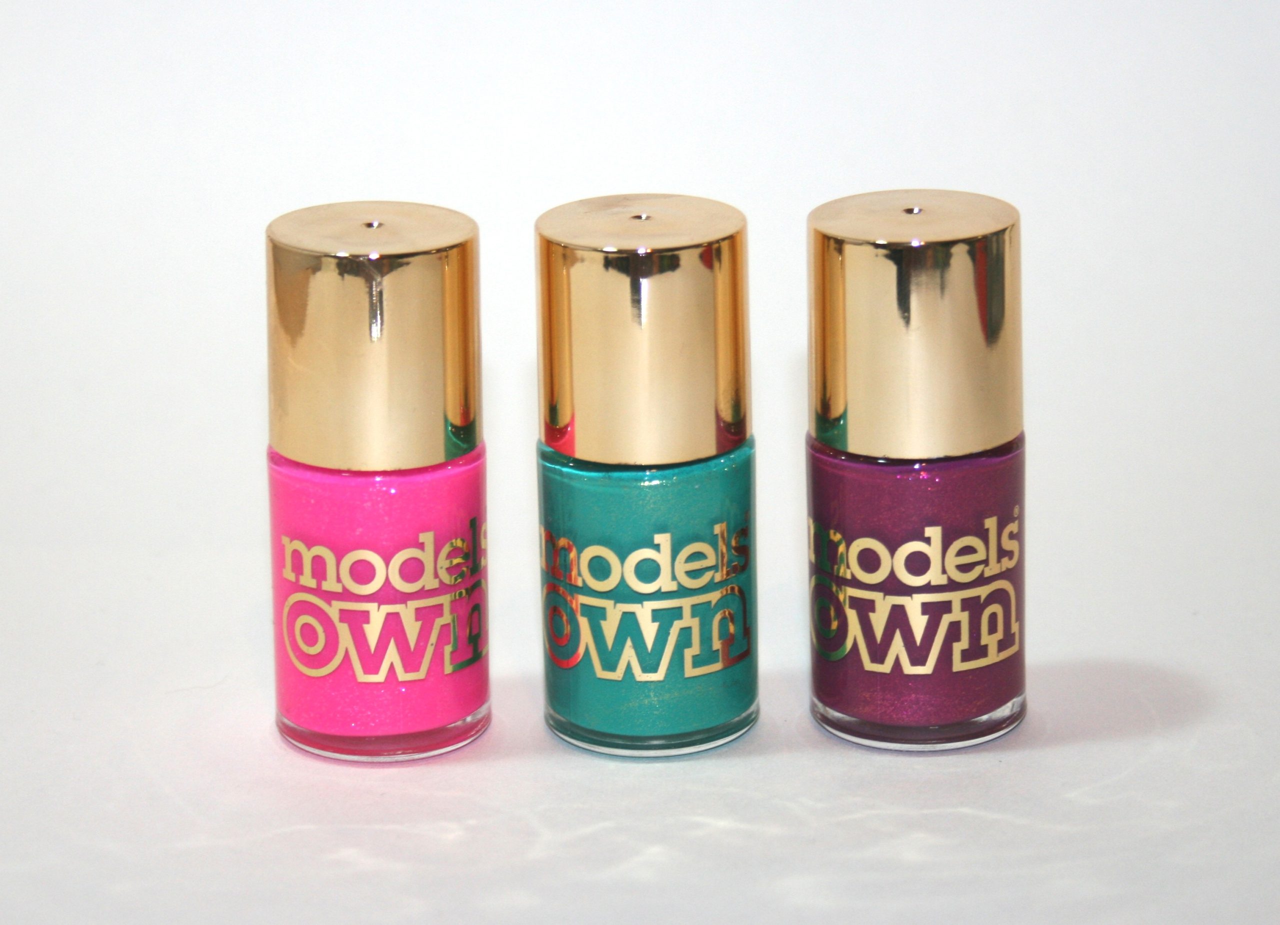 Models Own Diamond Luxe in Radiant Pink, Emerald Green and Oval Plum